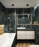 Modern bathroom with dark teal walls, white sink and vanity, bathtub, and wood floor.
