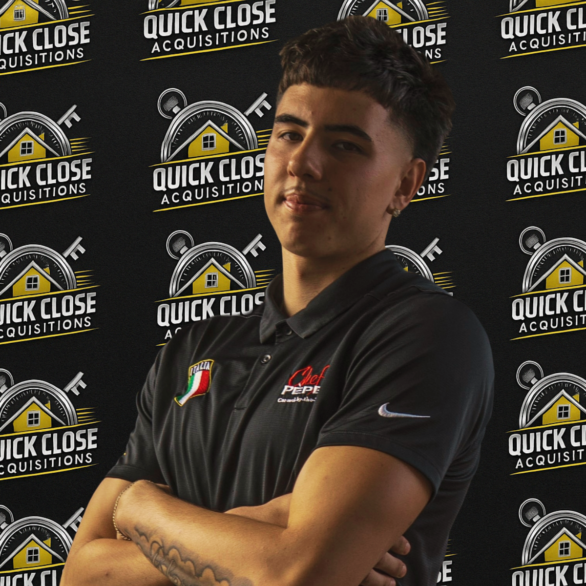 A man standing in front of a wall that says quick close acquisitions
