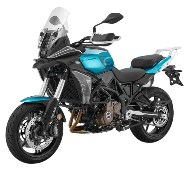 Una moto da avventura turchese e nera con parabrezza alto e pneumatici dual-sport, vista di profilo.