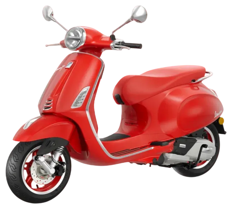 Uno scooter Vespa rosso acceso visto di profilo su sfondo bianco.