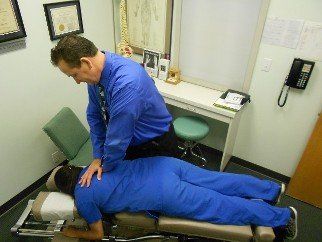 Dr. Sullivan Adjusting a Patient - Chiropractor in La Mirada, CA