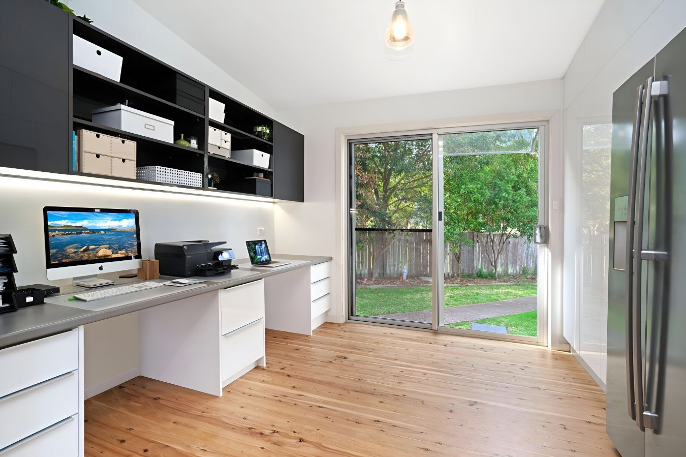 A Home Office With Two Desks, a Computer , a Printer, and a Refrigerator — Garry Jeans Kitchens In Cardiff, NSW