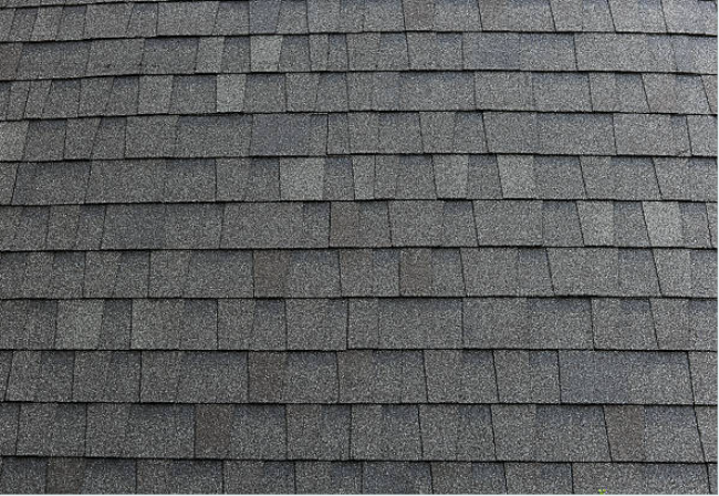 A close up of a roof with shingles on it