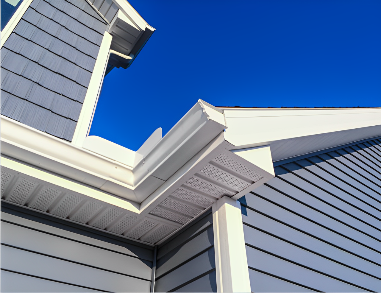 A house with a gutter on the side of it