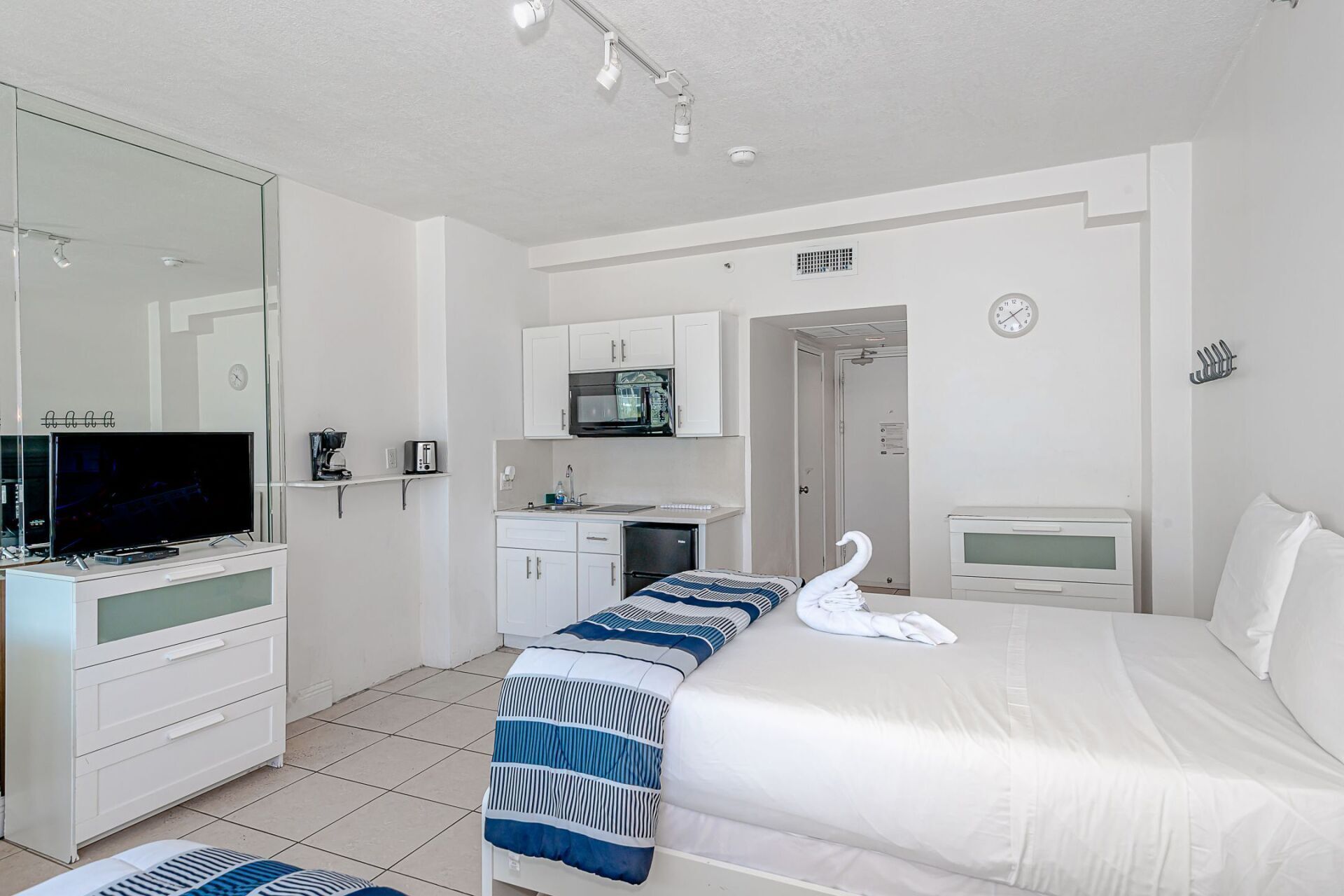 There is a large bed in the middle of the room.