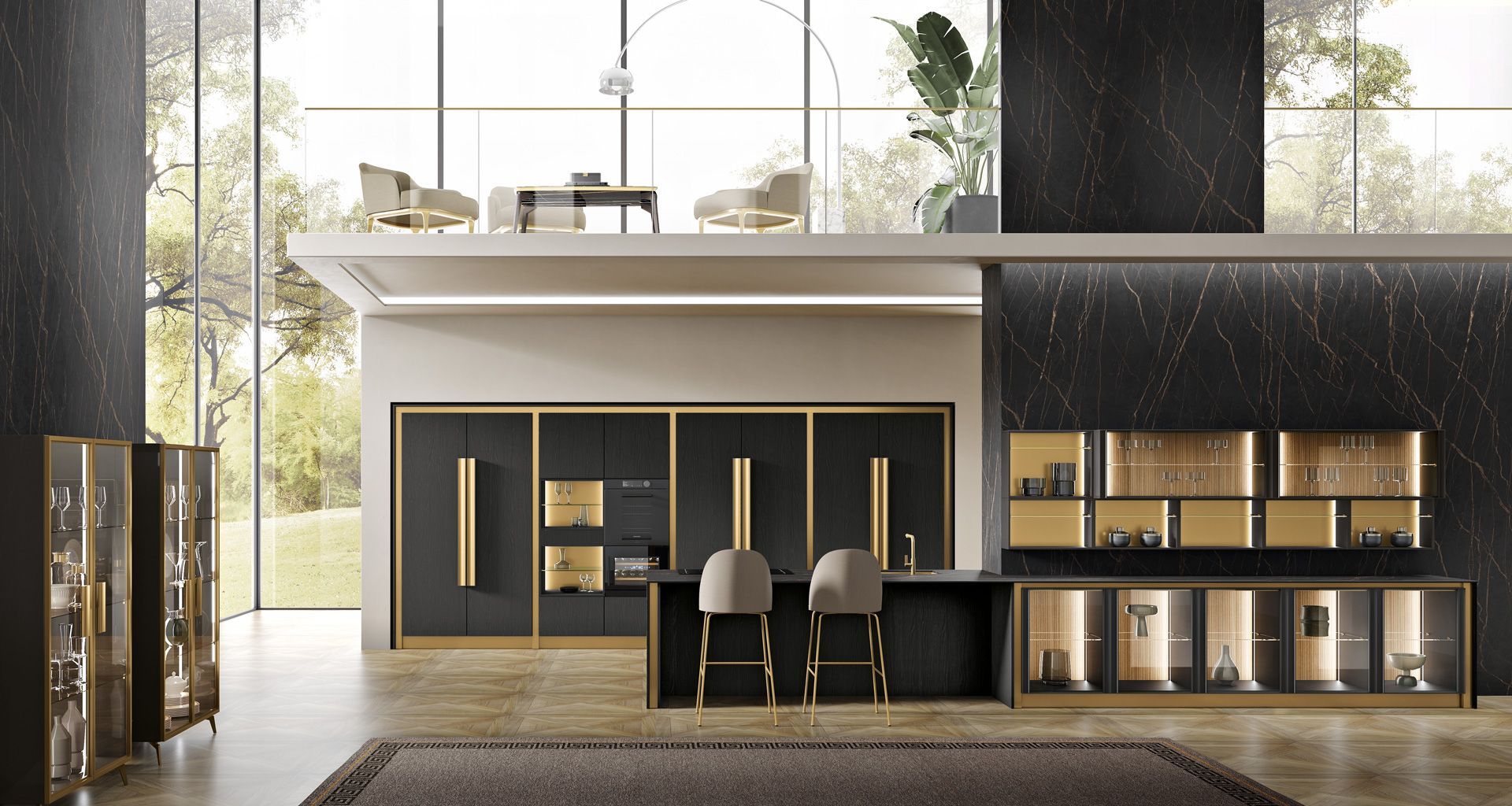 Una cucina con mobili neri, maniglie dorate e una grande finestra.