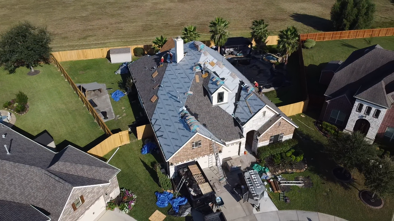 An aerial view of a house that is being remodeled