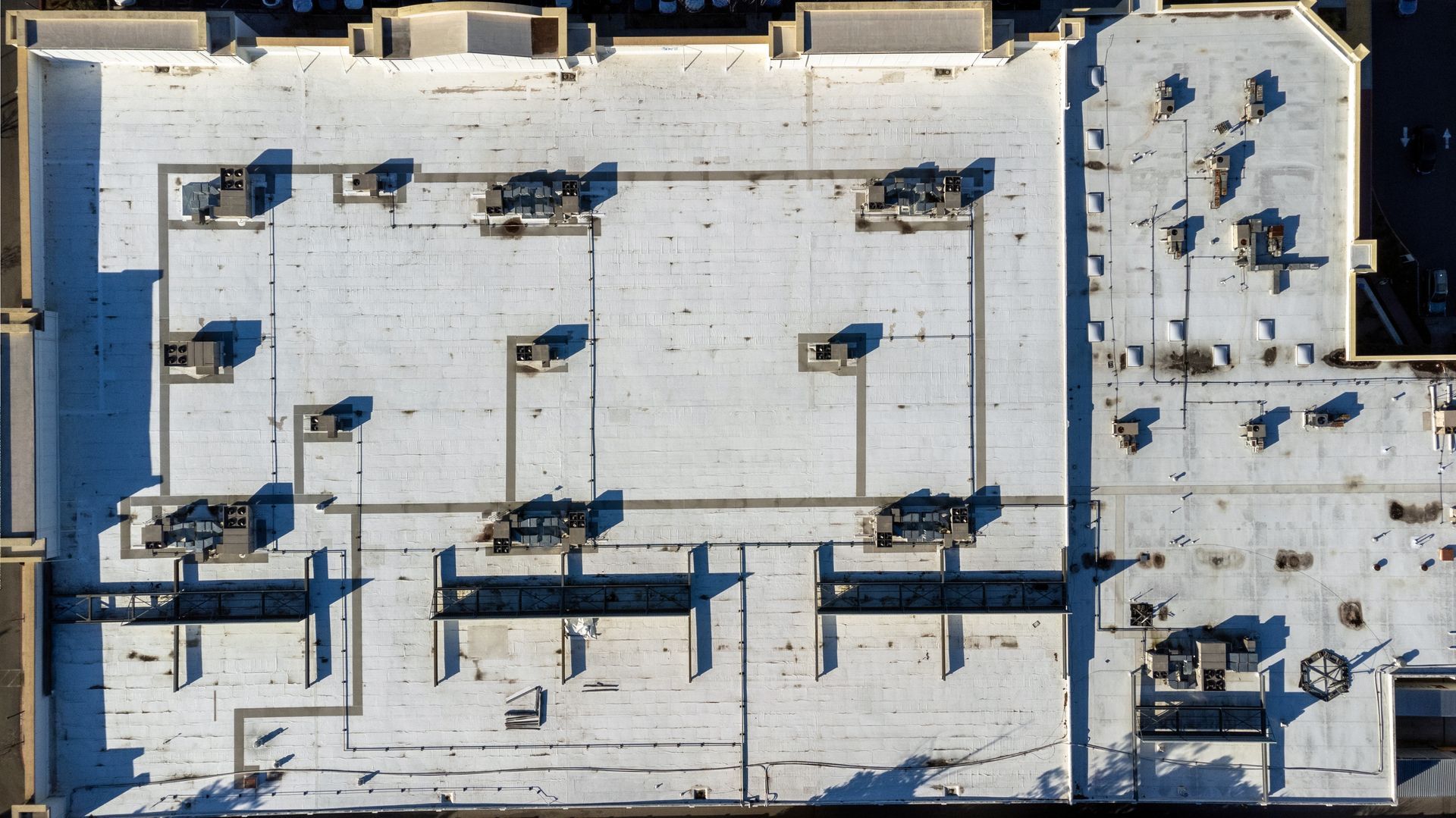 Industrial roof membrane blistering and seam damage on a flat commercial facility roof in Chattanooga TN. Industrial roof membrane blistering and seam damage on a flat commercial facility roof in Chattanooga TN.