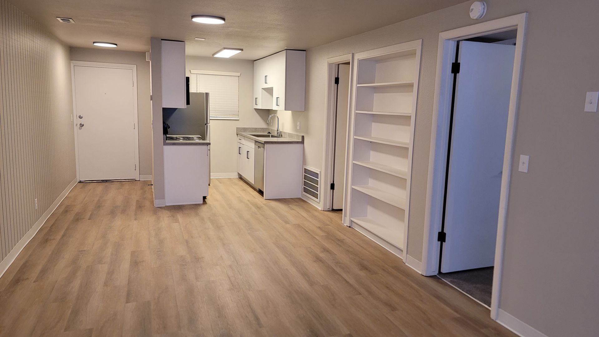 a house is being remodeled and there is a staircase in the middle of the room .
