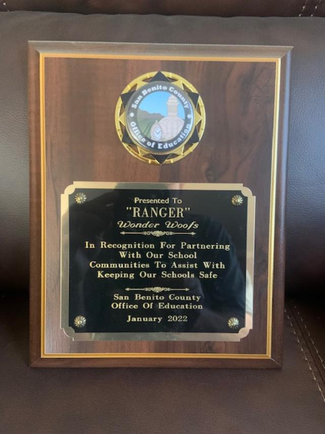 A wooden plaque that says ranger on it