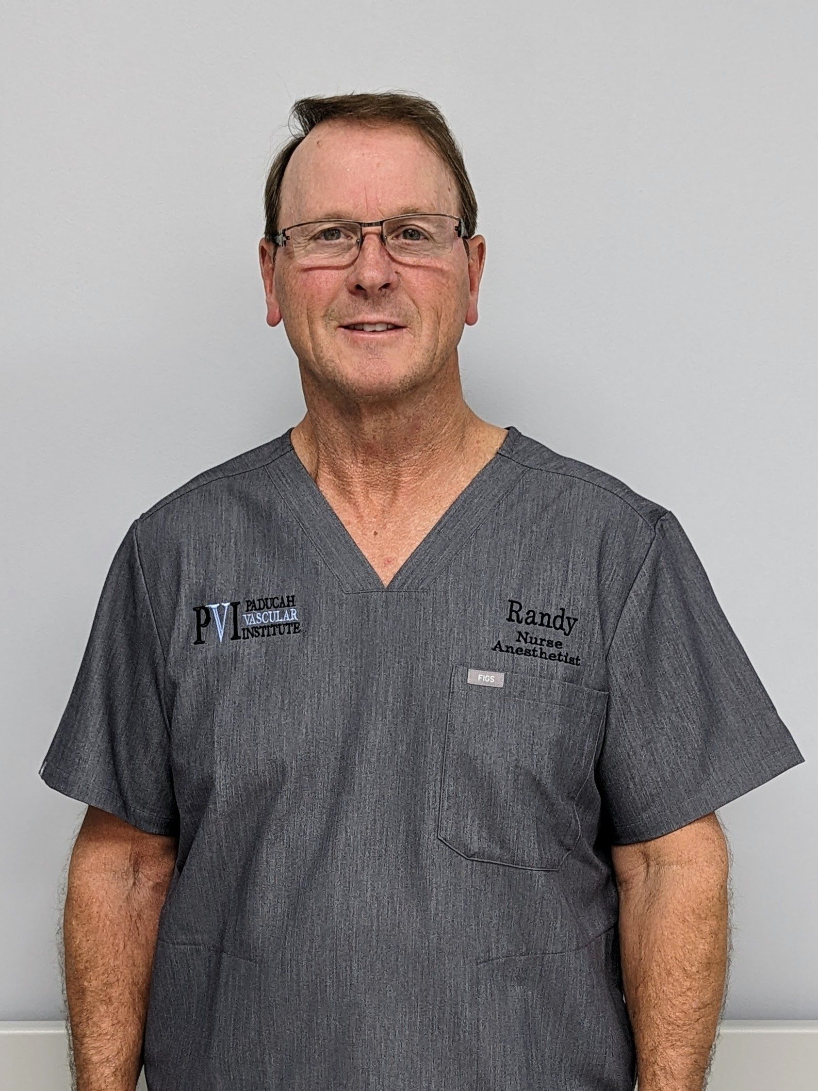Randy Wientjes, CRNA, a man wearing a scrub top with paducah vascular institute logo on it