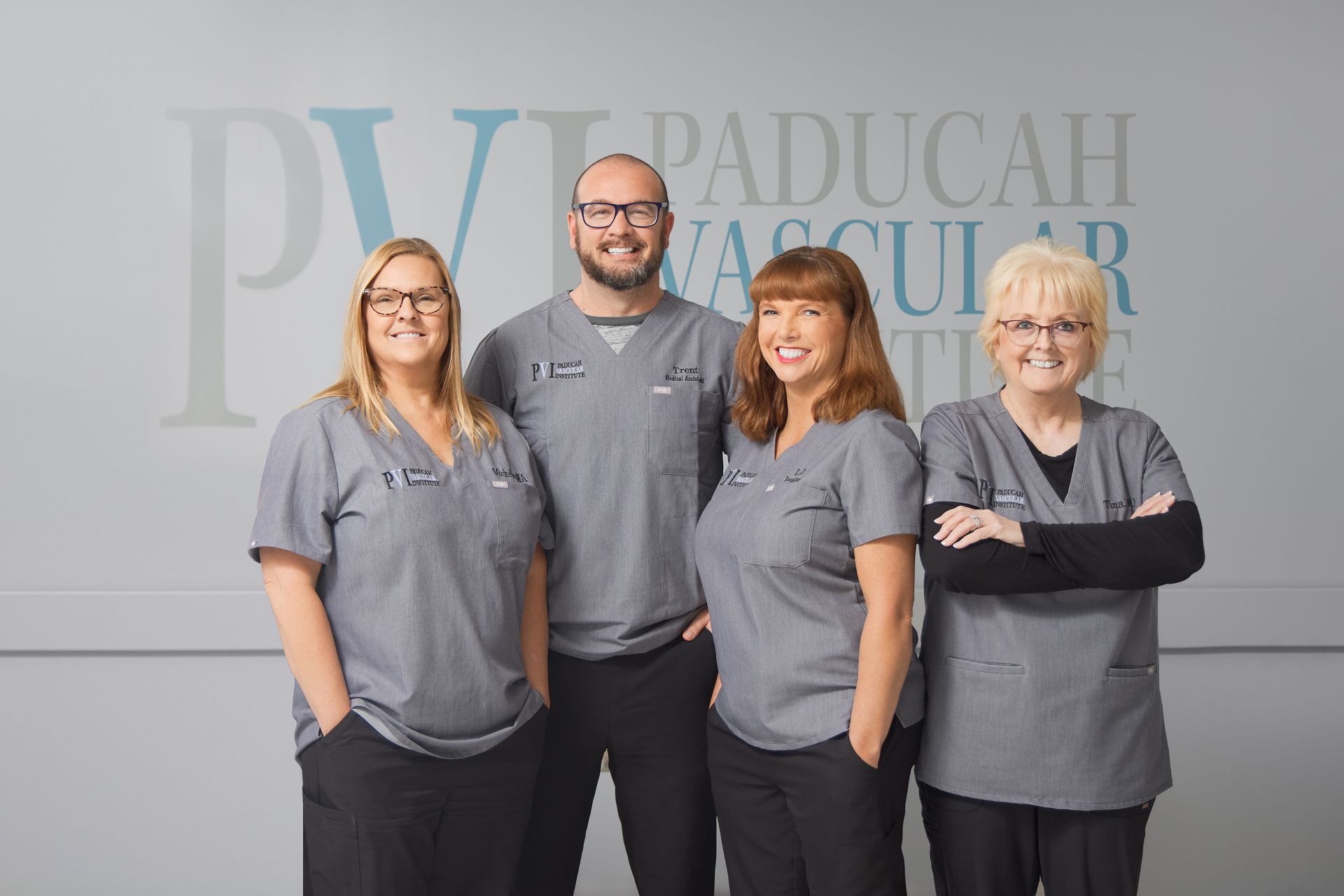 Paducah Vascular Institute Clinical & Clerical Staff.  A group of people in scrubs are posing for a picture.