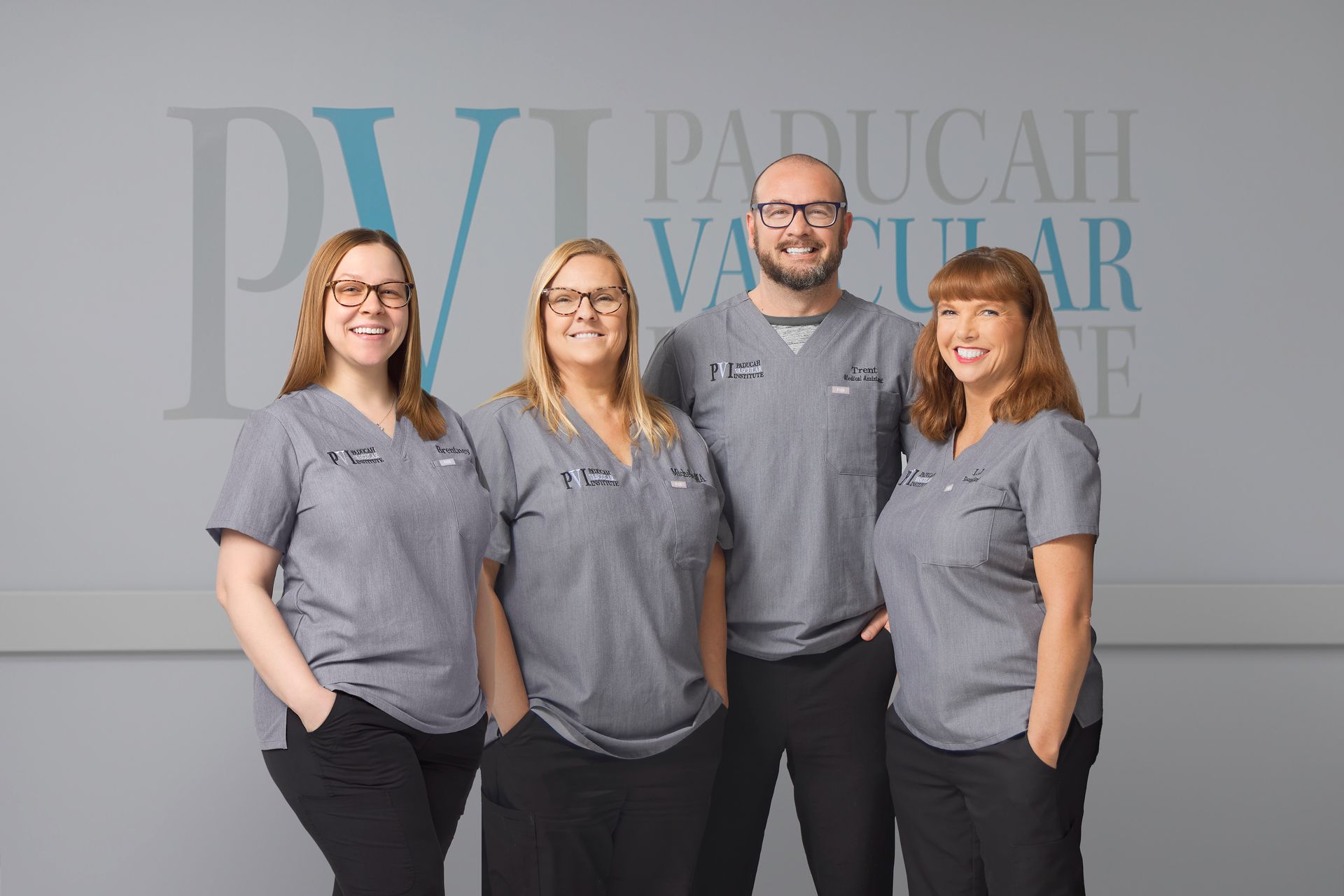 Paducah Vascular Institute Clinical & Clerical Staff.  A group of people in scrubs are posing for a picture.