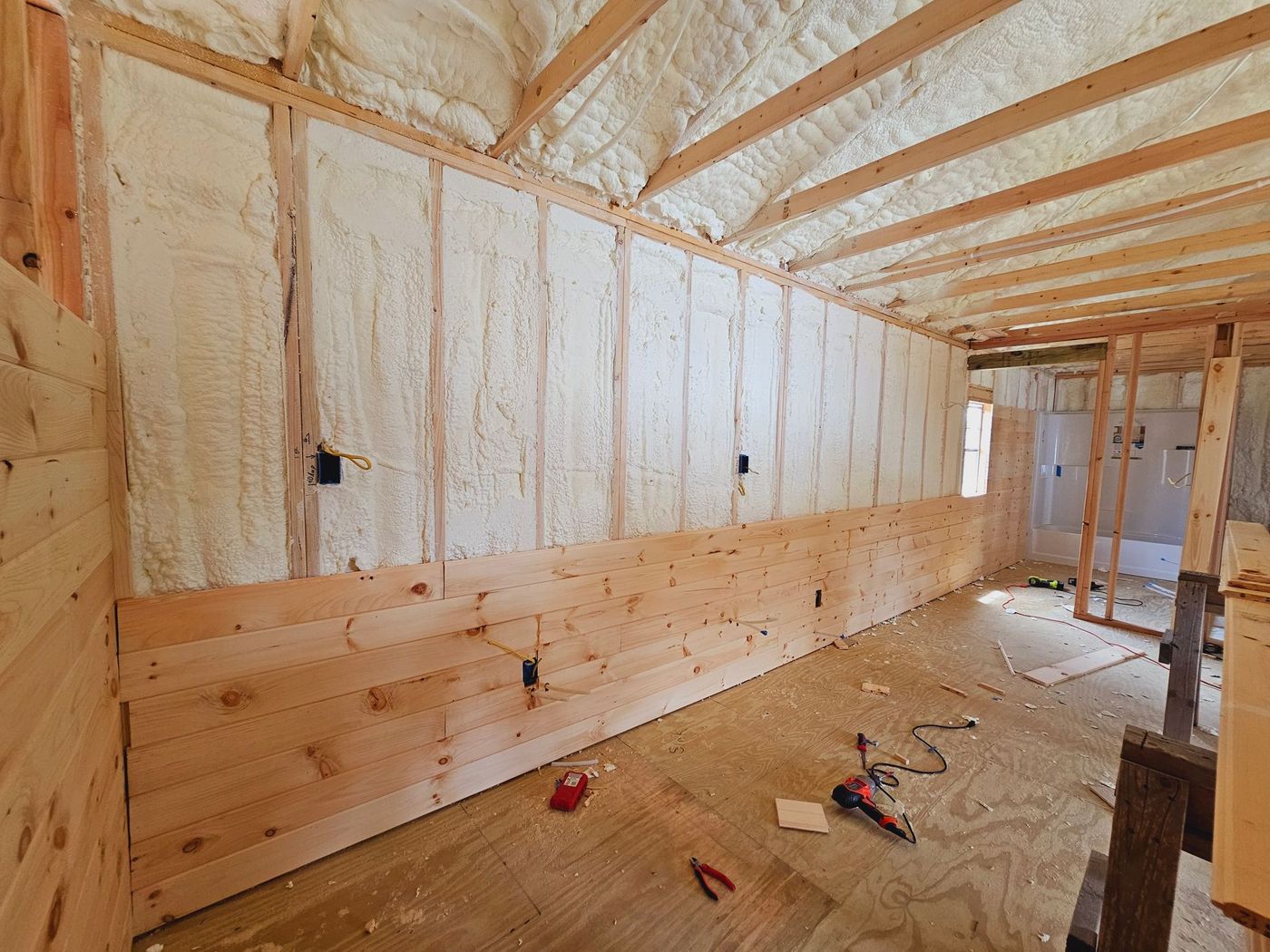 A room with a lot of insulation on the walls and ceiling.