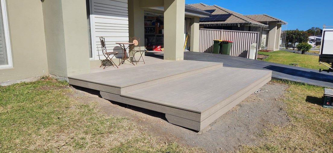 A Deck is in Front of a House — Mark Cannon Carpentry & Maintenance in Moonee Beach, NSW
