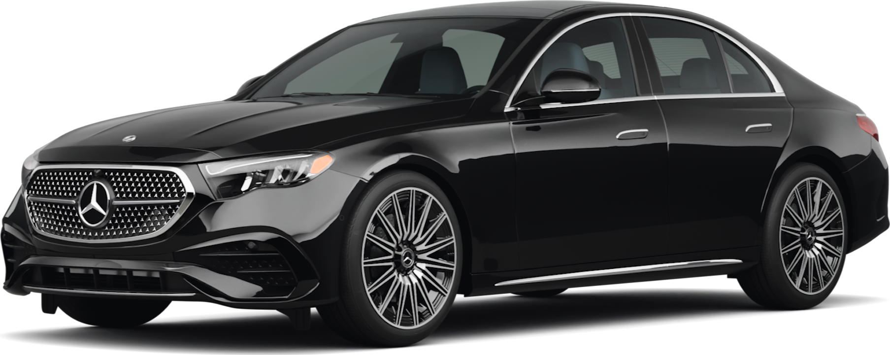 Black Mercedes-Benz sedan with a silver grill and wheels, angled slightly to the left.