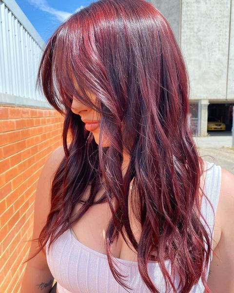 Woman With Long, Wavy Burgundy Hair — Lavish Hair in Shepparton, VIC