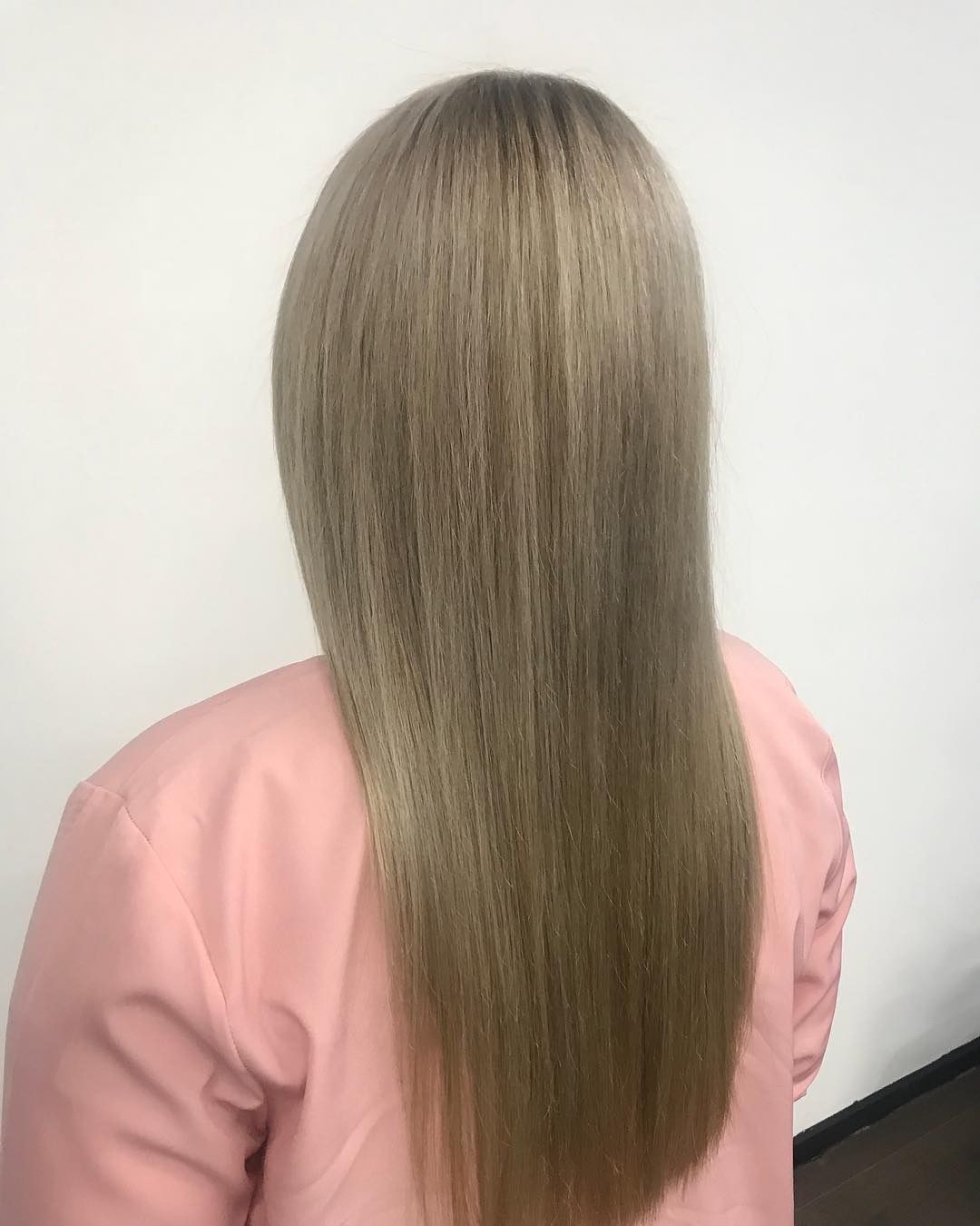 Woman With Long, Straight Ash Blonde Hair — Lavish Hair in Shepparton, VIC