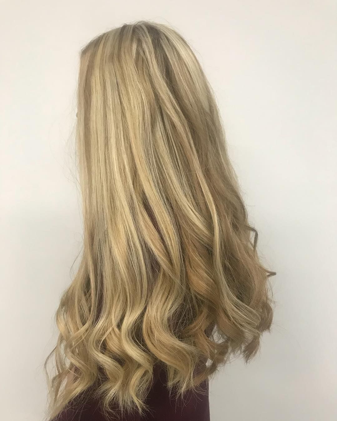 Woman With Long Wavy Blonde Hair — Lavish Hair in Shepparton, VIC