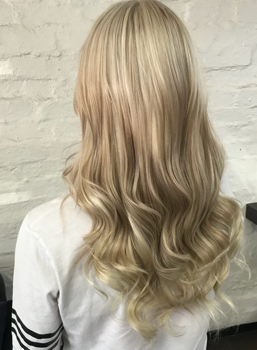 Blonde Hair With Highlights Styled in Loose Waves — Lavish Hair in Shepparton, VIC
