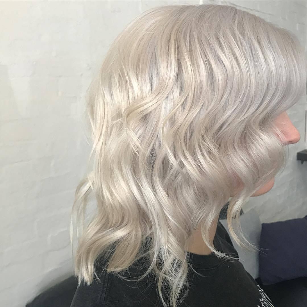 Woman With Wavy Platinum Blonde Hair — Lavish Hair in Shepparton, VIC