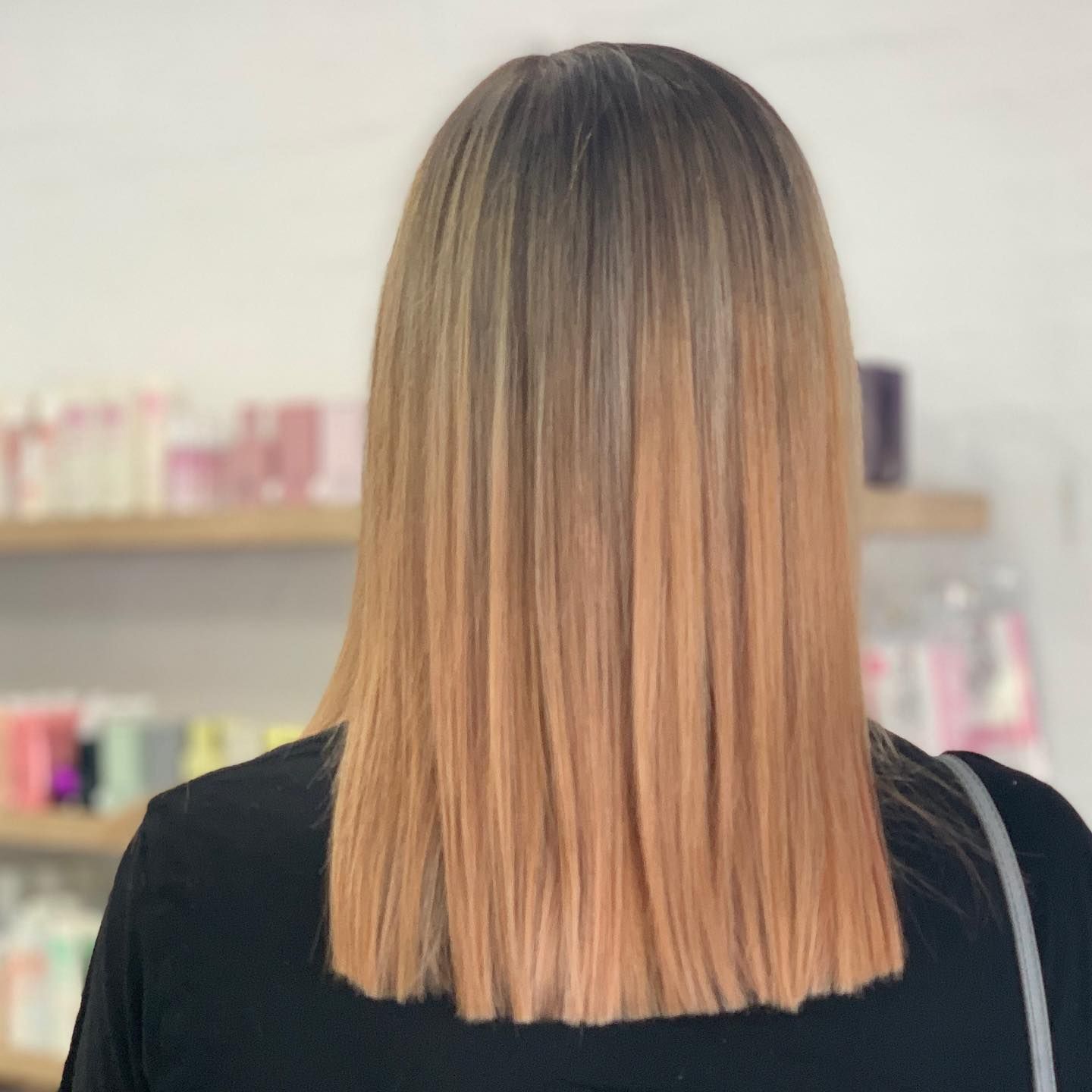 Woman With Straight, Blonde Hair With a Warm Peach Ombre — Lavish Hair in Shepparton, VIC