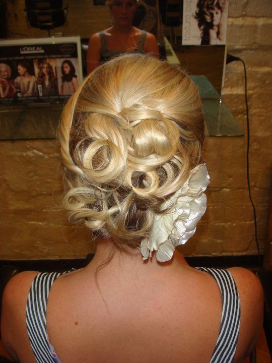 Blonde Updo Hairstyle With Curled Sections, Adorned With a White Flower — Lavish Hair in Shepparton, VIC