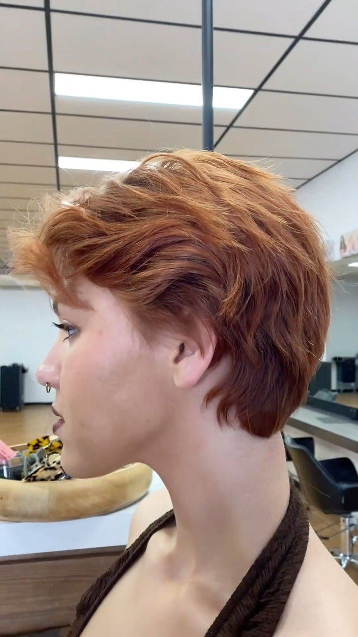 Woman With Short, Layered Reddish-brown Hair. Profile View in a Salon — Lavish Hair in Shepparton, VIC