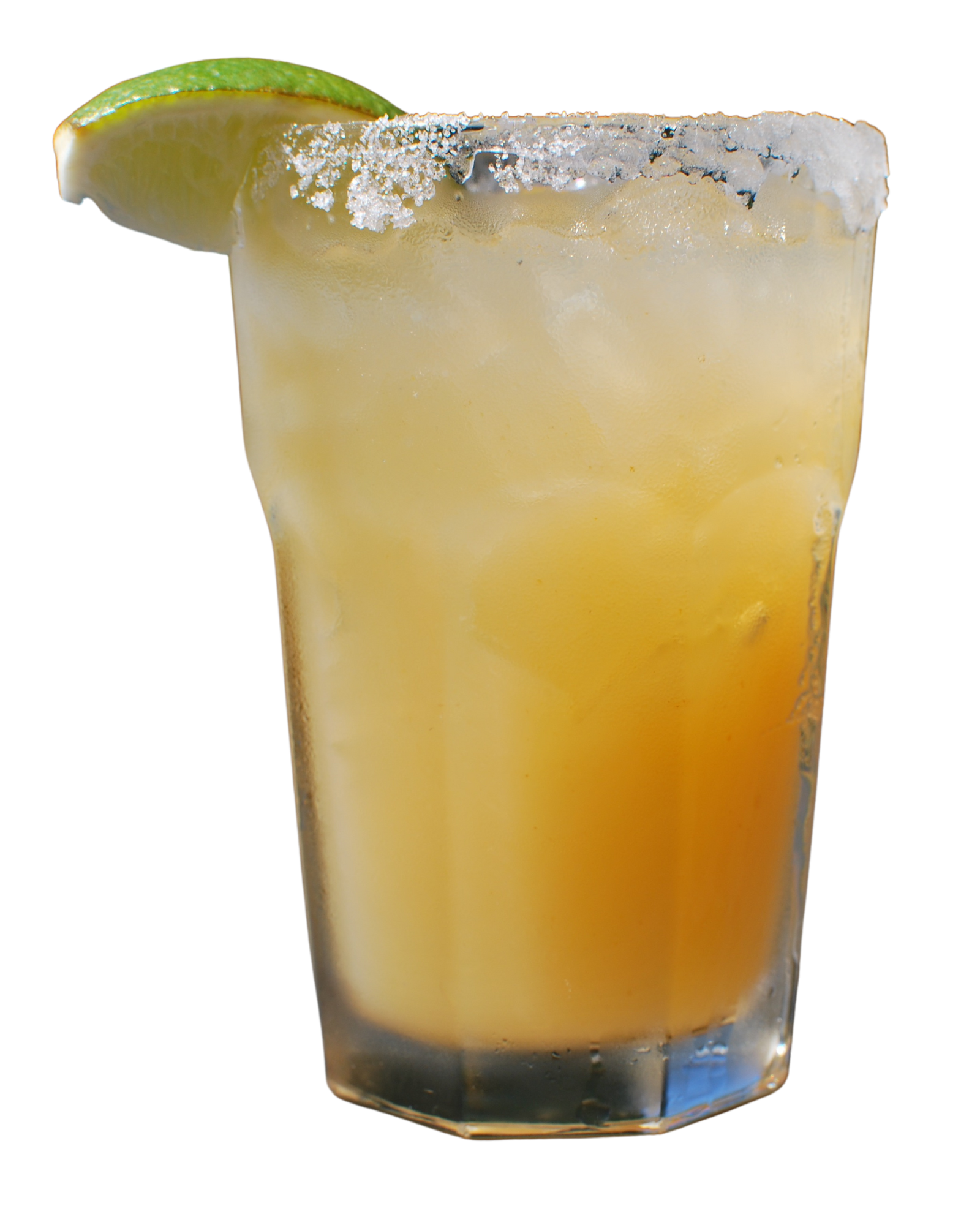 A close up of a margarita with a slice of lime on a white background.