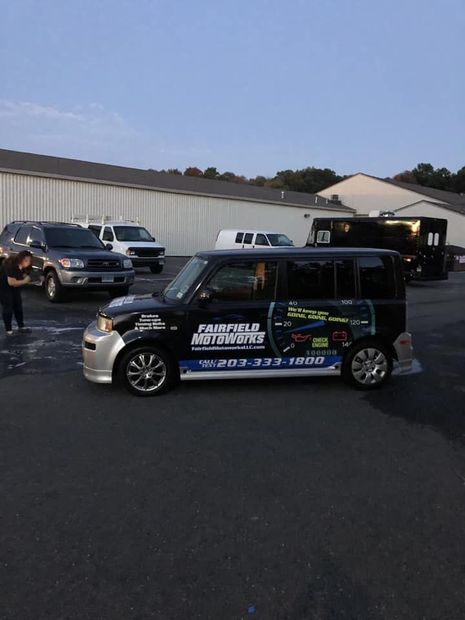 Fairfield Motoworks branded service vehicle parked outside | Fairfield Motoworks LLC
