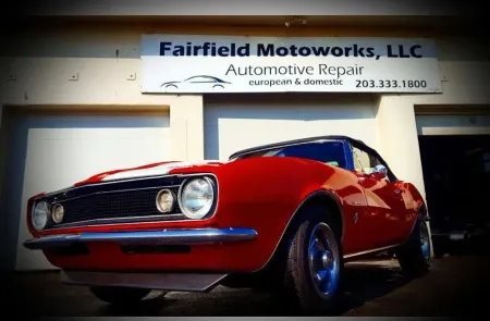 1970's Red Classic Car Parked In Front of Auto Shop | Fairfield Motoworks LLC
