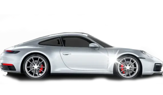 Silver Porsche 911 coupe with tinted windows, red brake calipers.