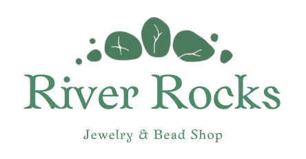 Logo for River Rocks Jewelry & Bead Shop, featuring a green stone design above the name.