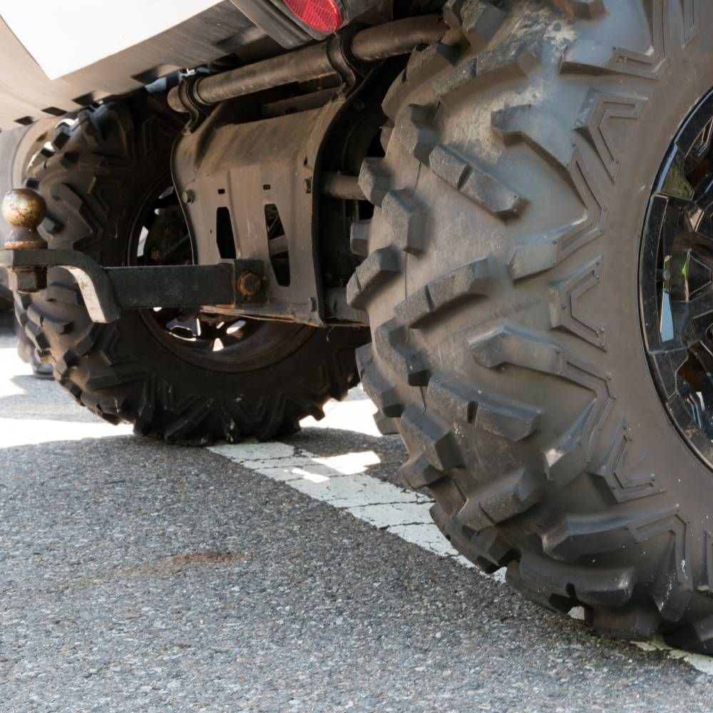 A close up of a tire on a vehicle