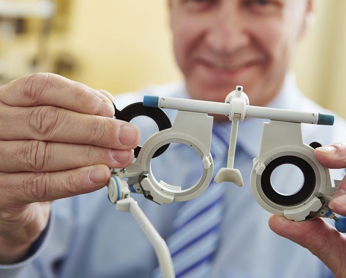 Doctor Putting Eye Measurement