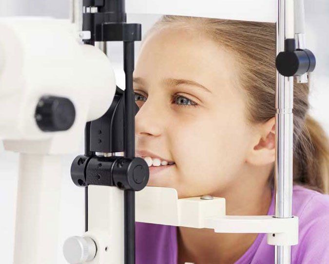 Girl Having Eye Check Up