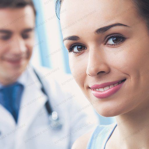 Doctor And Patient Smiling