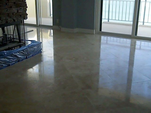 Polished marble floor reflecting natural light