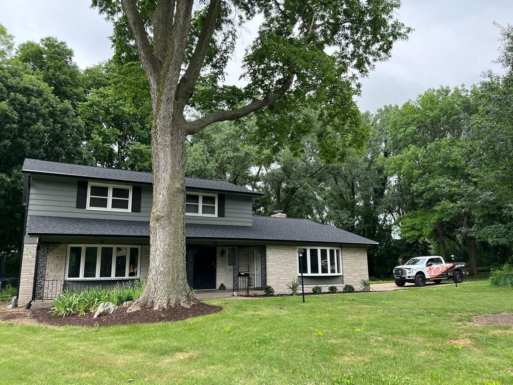 A House with A Tree in Front of It and A Truck Parked in Front of It | Fayetteville, NC | Danny Odom Roofing