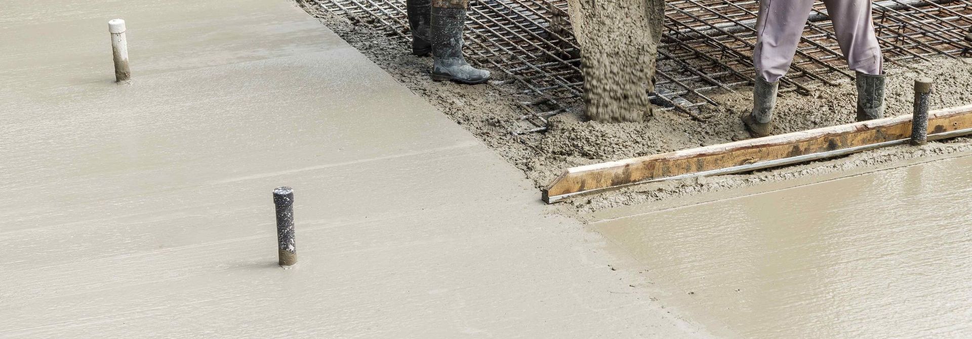 Pouring Concrete For Construction Of Slab Foundation