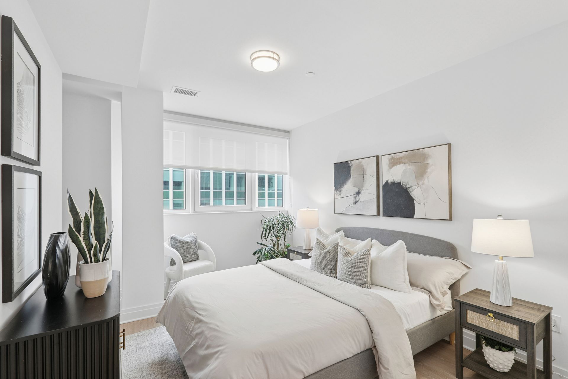 An artist 's impression of a bedroom with a large bed