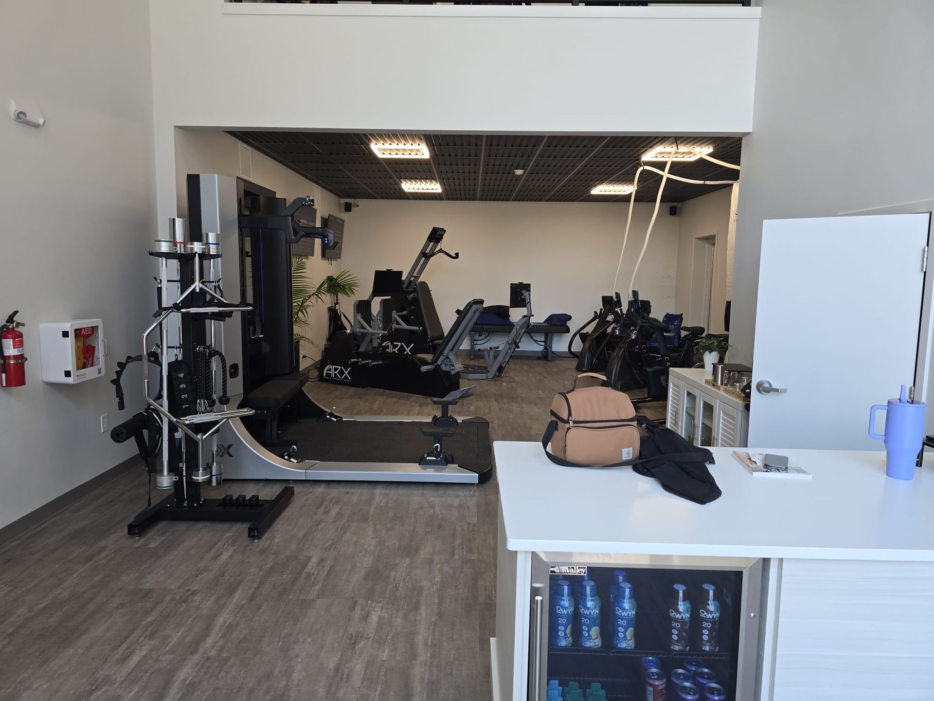 Interior view of the machines and front desk of The Smart Fit Method