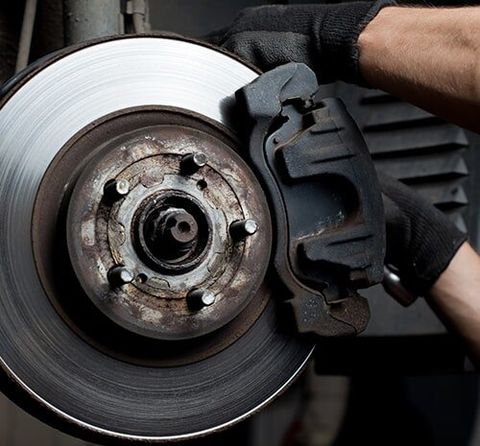 Car Mechanic Repairing Brake Pads — Mechanical Repairs In Mullumbimby, NSW