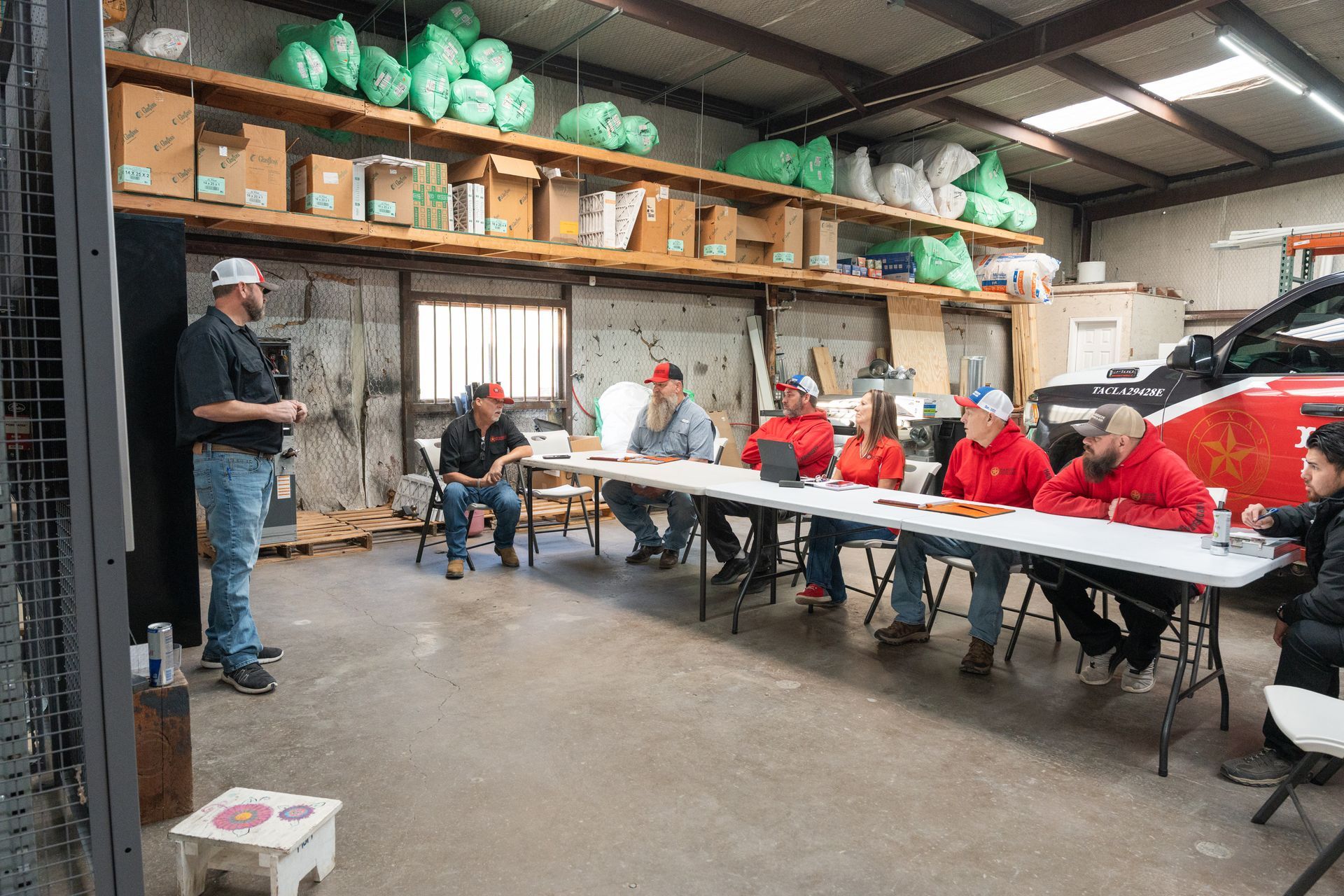 Group of Hardin Heating & Air Technician in a workshop meeting.