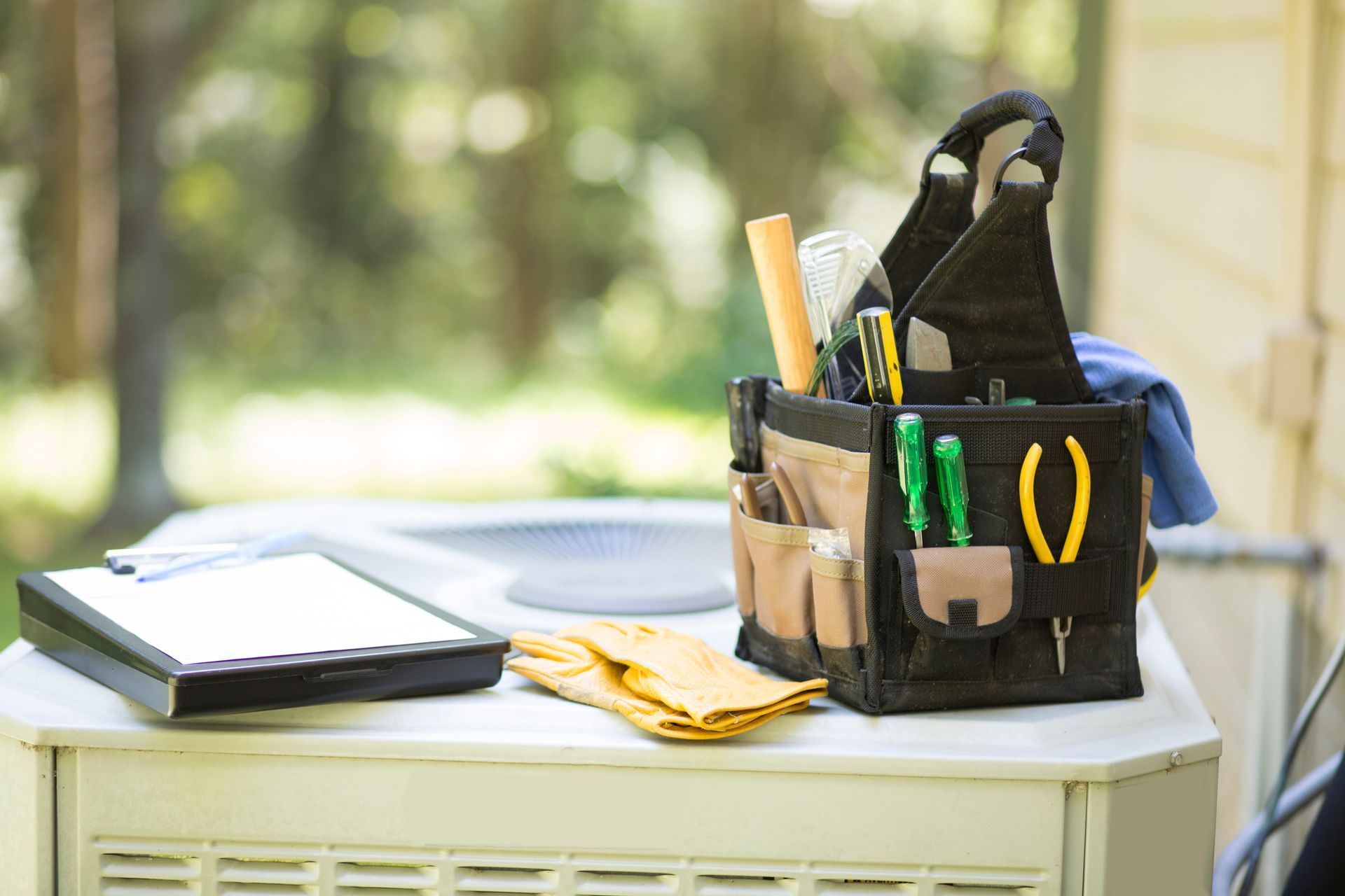 HVAC technician servicing residential air conditioning unit in Midlothian Texas.