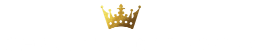 a gold crown is floating in the air on a white background .