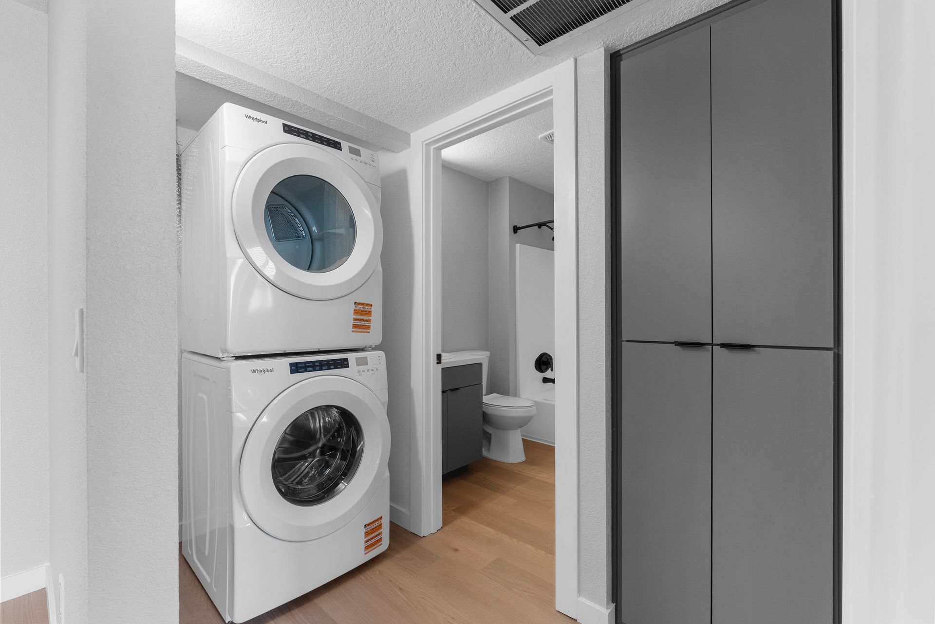 apartment laundry room and bathroom