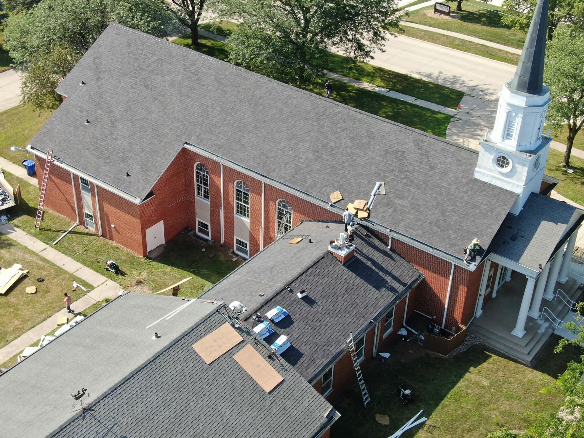 An aerial view of a church that is being remodeled