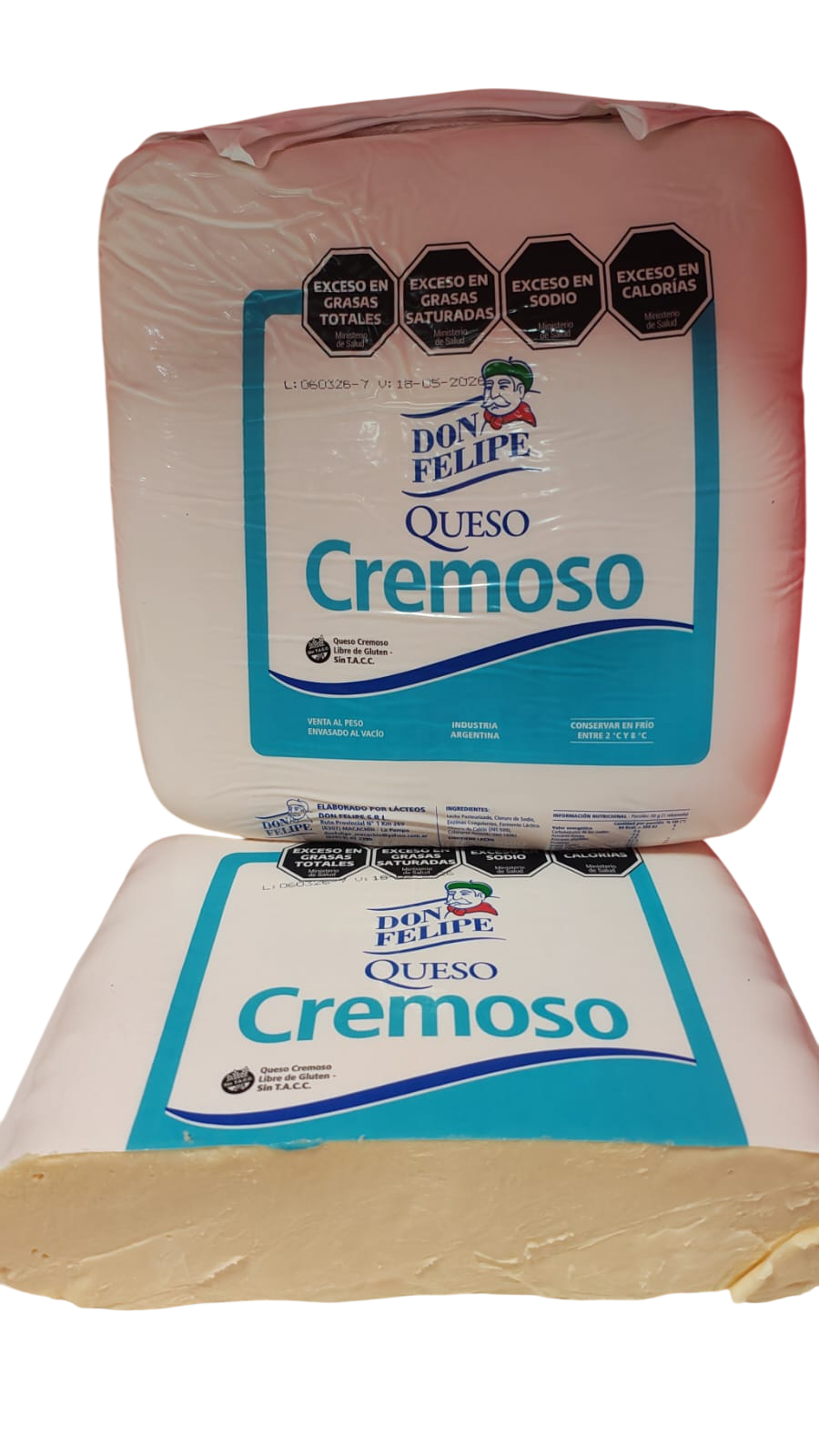 Dos bloques de queso Queso Cremoso en envases de color beige y turquesa, uno apilado sobre otro.