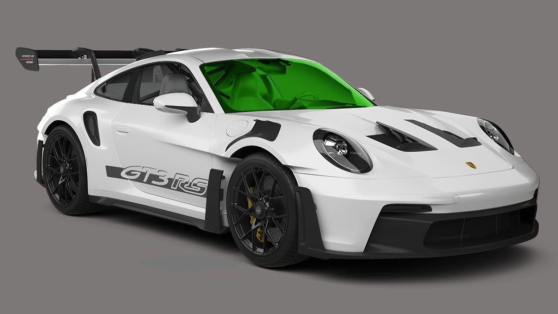 A white porsche 911 gt3 rs with a green windshield on a gray background.
